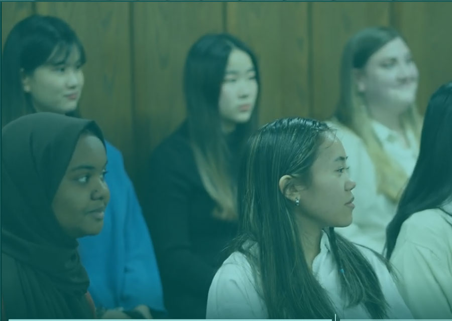 students sitting in the juror box